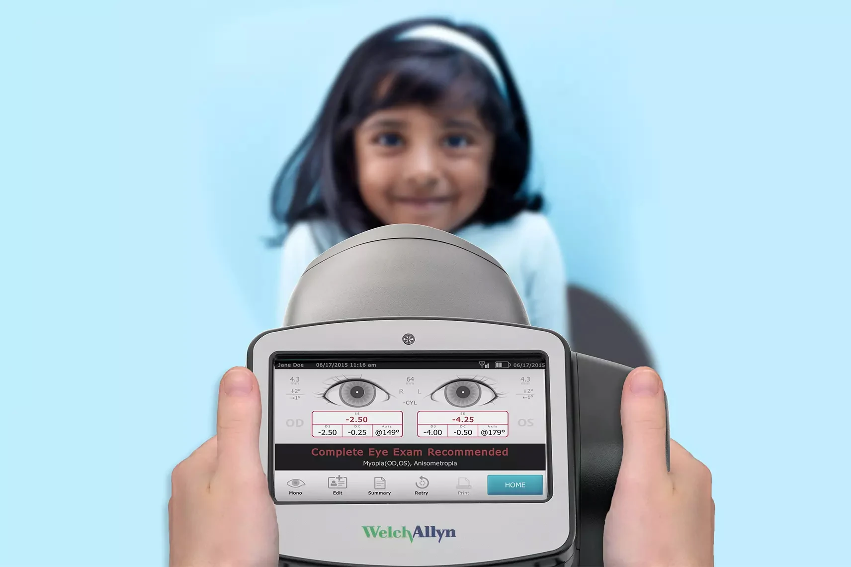 Screen view of Spot Vision Screener with child in background